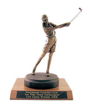 FOLLOW-THRU LADY GOLFER